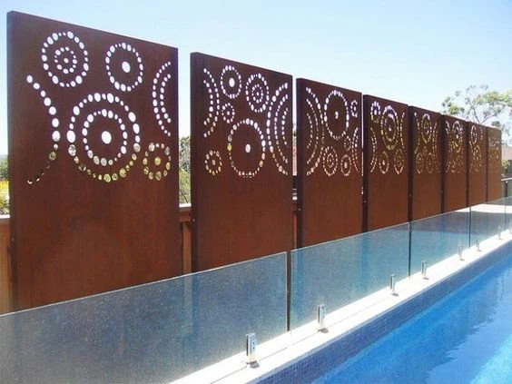 Corten steel panels decorated with circles